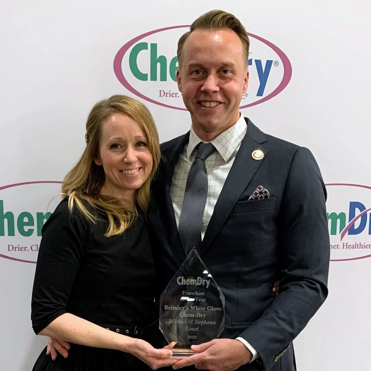 Owner of Brimley's Chem-Dry receiving a Chem-Dry award